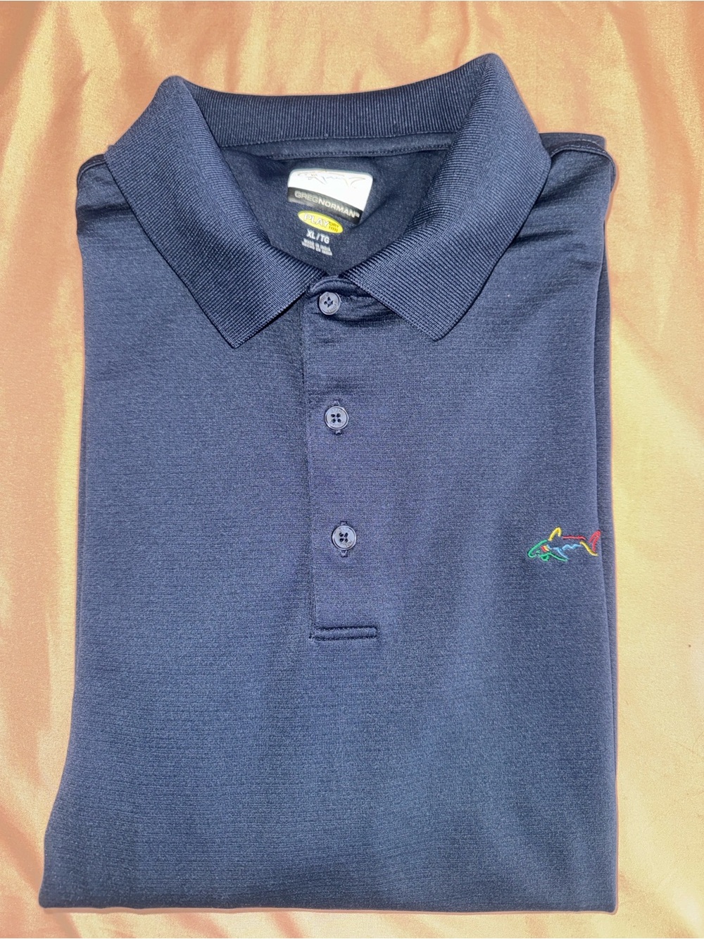 Greg Norman Collection Navy Blue Polo Shirt with Multi-Color Shark Logo